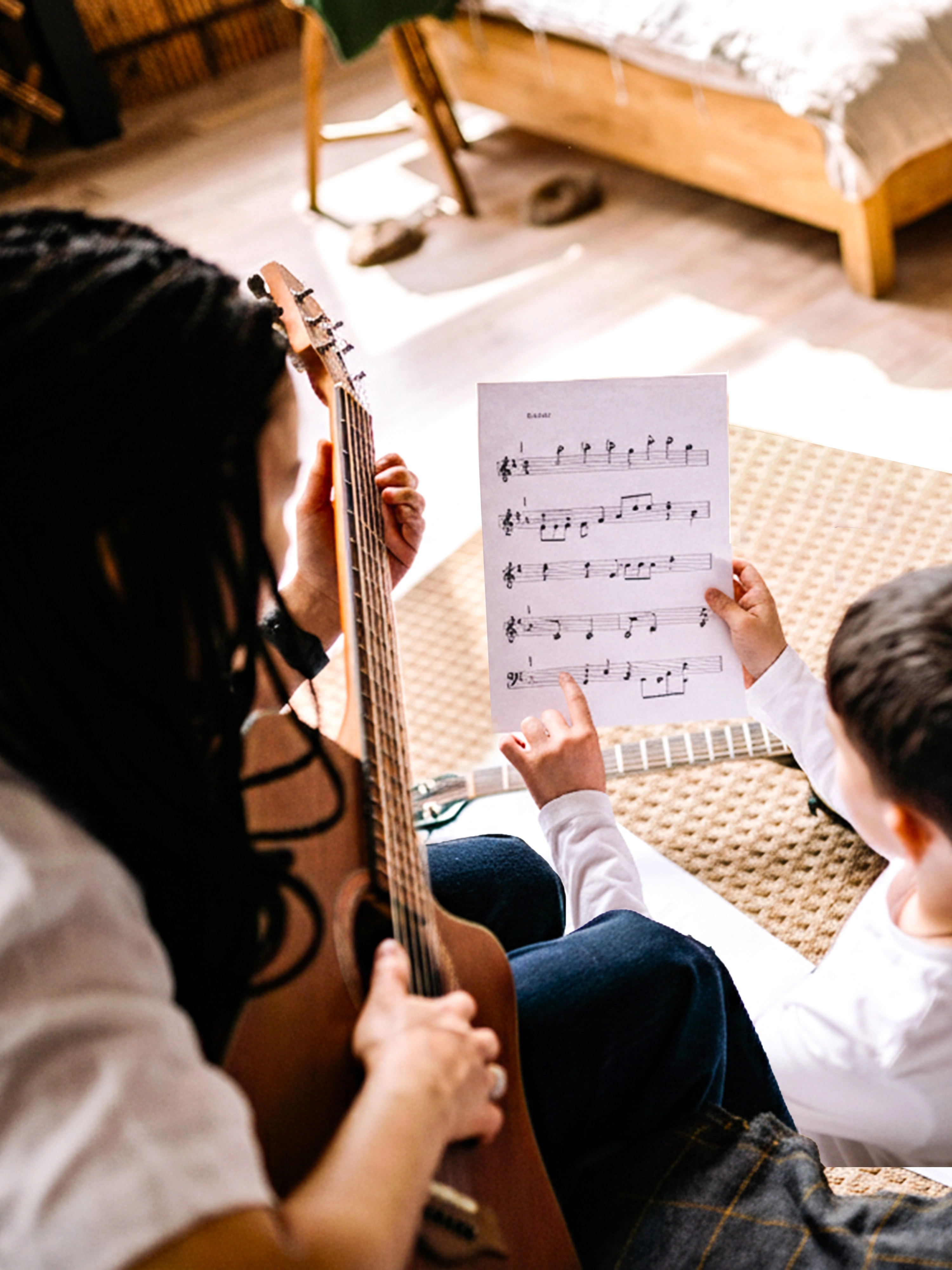 Children sharing music together
